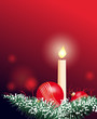 Christmas decoration with a candle and a red bauble
