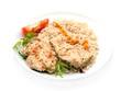 Turkey breast steaks seasoned with spices on a pan