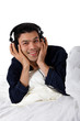 Nepalese man in pajamas, headphones