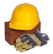 Bricks ,hard hat and protective gloves