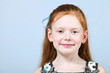 Foto: Portrait of trendy red-haired girl Portrait of trendy red-haired girl