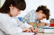 Girl and boy learning
