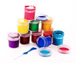 Colorful vibrant cans of gouache isolated on white