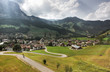 Typisches Dorf mit Kirche in Südtirol vor Bergpanorama Typisches Dorf mit Kirche in Südtirol vor Bergpanorama