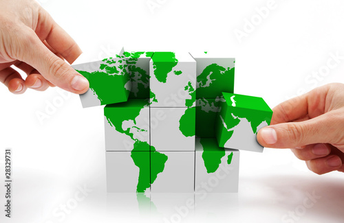 Photo: imagen conceptual con puzzle 3d y mapa del mundo imagen conceptual con puzzle 3d y mapa del mundo