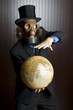 Foto: Businessman wearing a gasmask holding an earth globe Businessman wearing a gasmask holding an earth globe