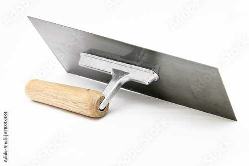Photo: isolated of german style lute trowel over white background isolated of german style lute trowel over white background