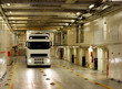 White truck on the cargo deck of the ferry White truck on the cargo deck of the ferry