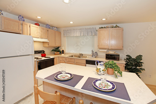 Photo: Kitchen with maple cabinets Kitchen with maple cabinets