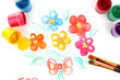 Opened paint buckets colors and drawing flowers