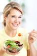woman eating salad woman eating salad