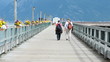 Women walking on dock pier Alaska P HD 0061