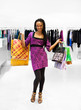 Young women with packages in the shop