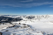 Blue sky over snowy white mountains