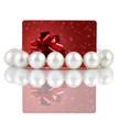 Photo: Pearls with creative red gift card, on a white background Pearls with creative red gift card, on a white background
