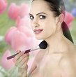 woman doing makeup