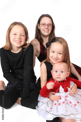 Photo: four girls of different ages four girls of different ages