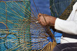 Italy, Sicily, a fisherman making a lobster pot