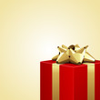 Red gift with gold bow vector background Red gift with gold bow vector background