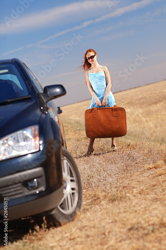 Photo: girl near the car girl near the car