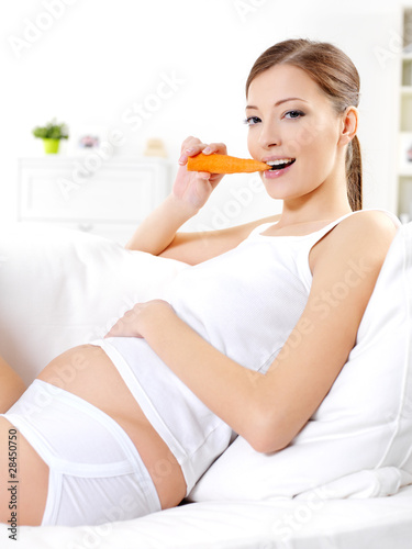 pregnant woman eating. pregnant woman eating fresh