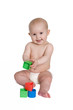 Cute Baby in Diaper Playing With Colorful Blocks Cute Baby in Diaper Playing With Colorful Blocks