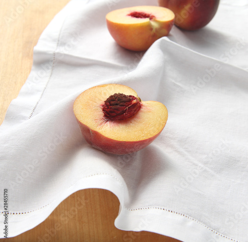 Photo: fresh peaches on a napkin fresh peaches on a napkin
