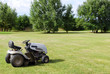 Photo: lawn mower on field lawn mower on field