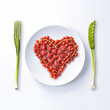 Coeur formé de fruits rouges à déguster