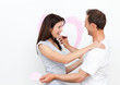 Happy woman hugging her boyfriend after drawing a heart