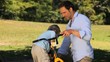 Son taking the bike after the repairs