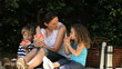Family eating watermelon