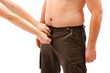 Hands opening or closing man's placket