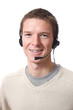 young professional smiling man talking with headset