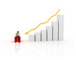 Photo: Young businessman very unhappy with chart going down Young businessman very unhappy with chart going down