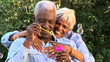 Video: Close up of senior couple blowing bubbles outdoors Close up of senior couple blowing bubbles outdoors