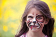 happy face painted girl happy face painted girl