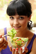 Young Woman Eating Salad. Model Released