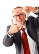 senior business man makes a sign with his hands