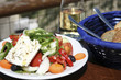 Photo: Typical taverna meal, salad, bread and white wine. Crete Typical taverna meal, salad, bread and white wine. Crete