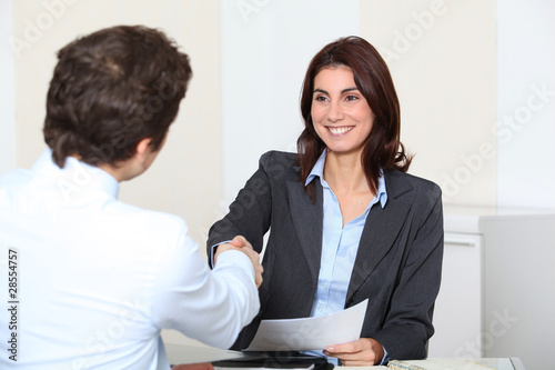Photo: Job applicant having an interview Job applicant having an interview