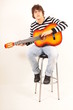 Photo: Junger Gitarrenspieler Junger Gitarrenspieler