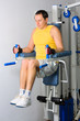 Man training in fitness center