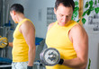Man training in fitness center
