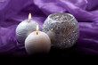Silver candles with purple background