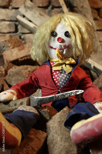 Photo: Scary doll with big knife Scary doll with big knife