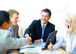 Business people shaking hands, finishing up a meeting