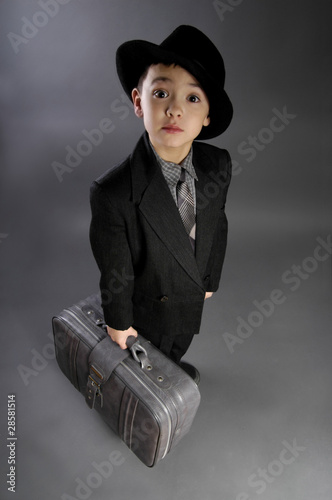 Photo: The boy in a suit of traveler The boy in a suit of traveler