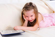Little girl lying on the couch Little girl lying on the couch