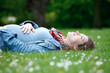 Image : Beautiful pregnant woman relaxing on grass